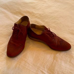 Oxblood red Cole Haan oxford wingtips.
